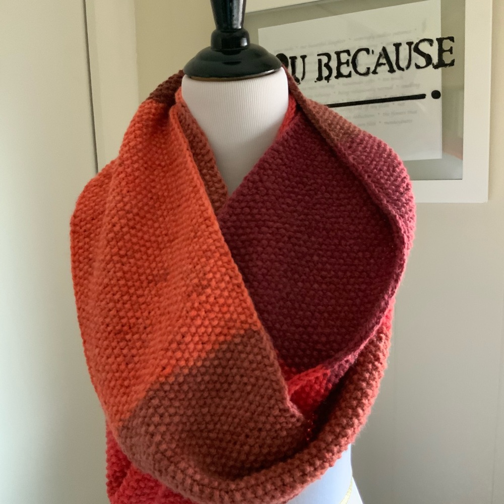 Hand knit scarf/cowl. Wear as a single loop or a doubled cowl. Wool and acrylic